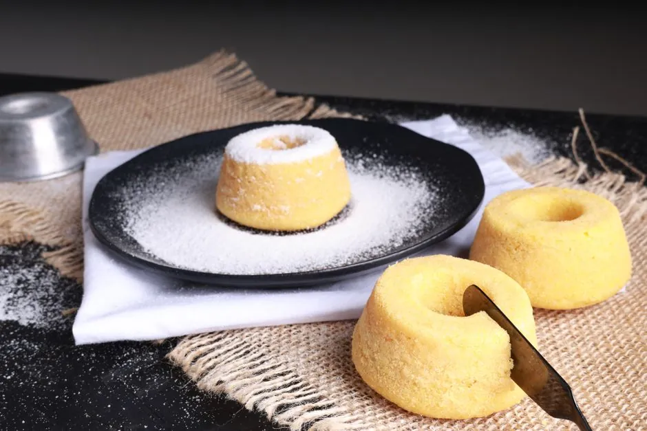Savor the sweetness of homemade mini bundt cakes topped with powdered sugar icing.