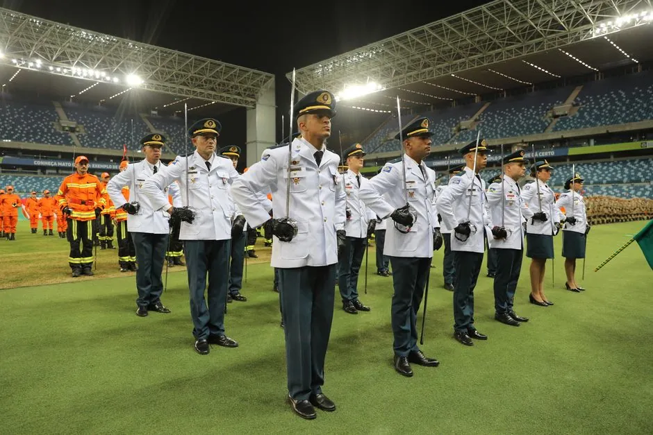 A military formation in a stadium, showcasing disciplined officers in Mato Grosso, Brazil.
