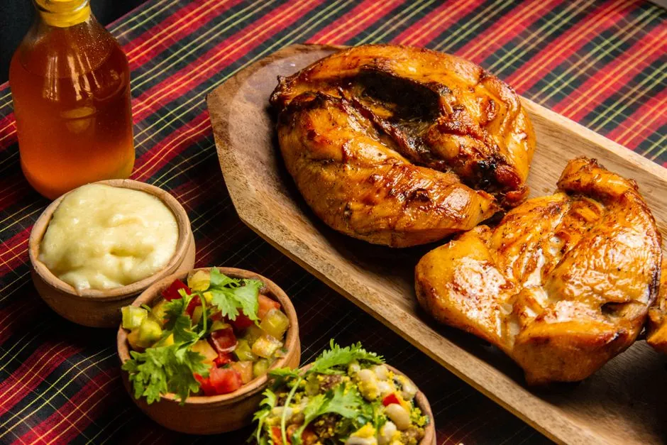 Savor the taste of rich, smoky grilled chicken with traditional sides perfect for a hearty meal.