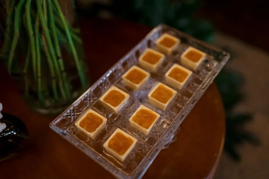 A close-up of desserts arranged on a crystal tray, perfect for elegant events.